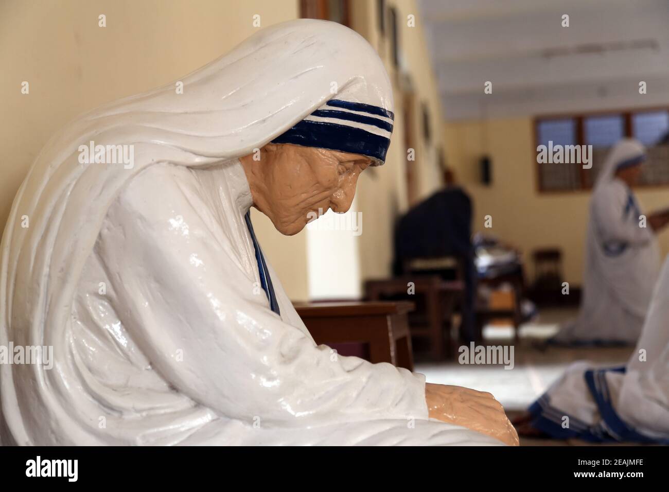 The statue of Mother Teresa in the chapel of the Mother House, Kolkata, India. The statue was made in the pose in which the Mother prayed. Stock Photo