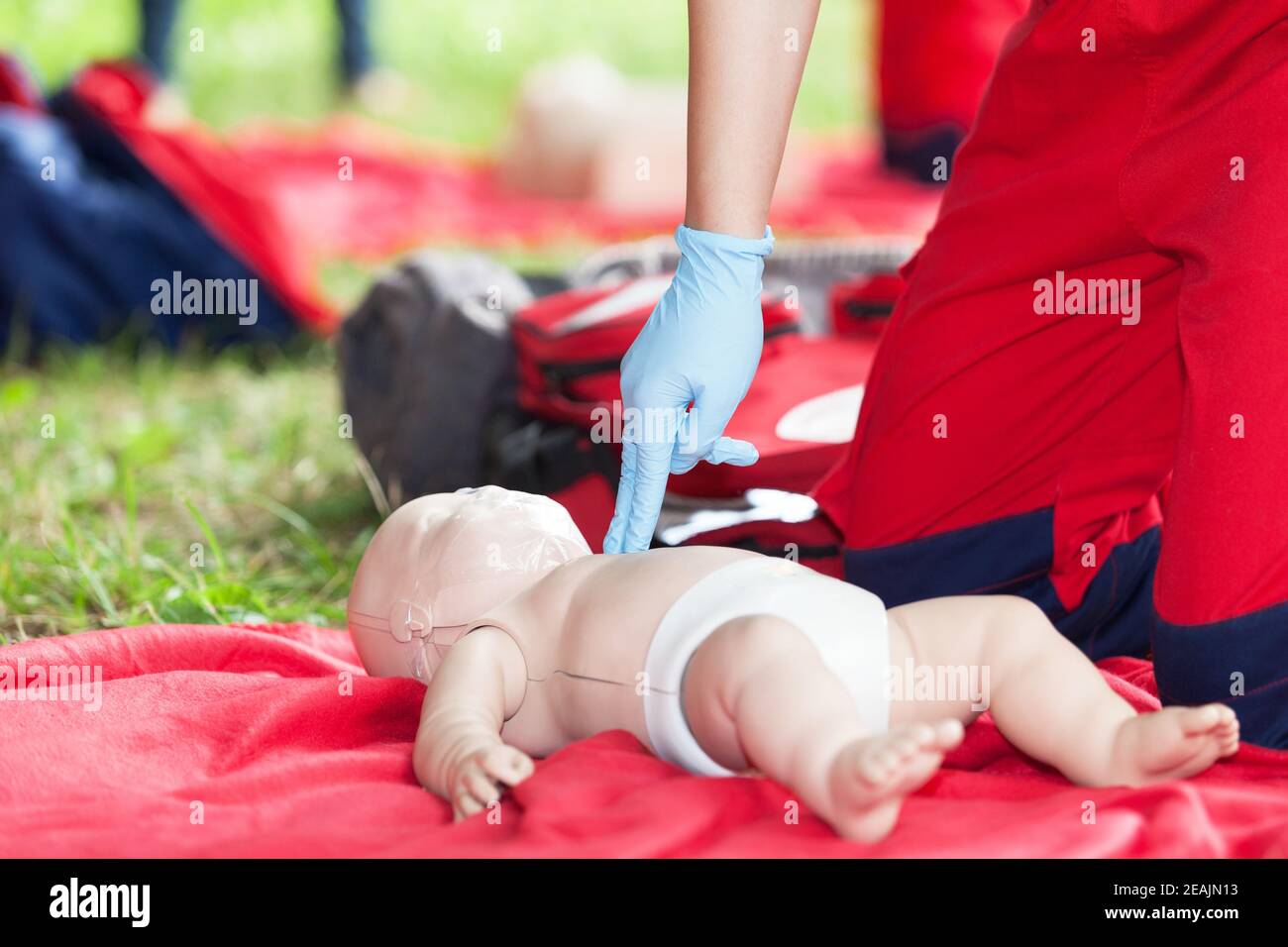 Baby CPR dummy first aid training. Heart massage Stock Photo Alamy