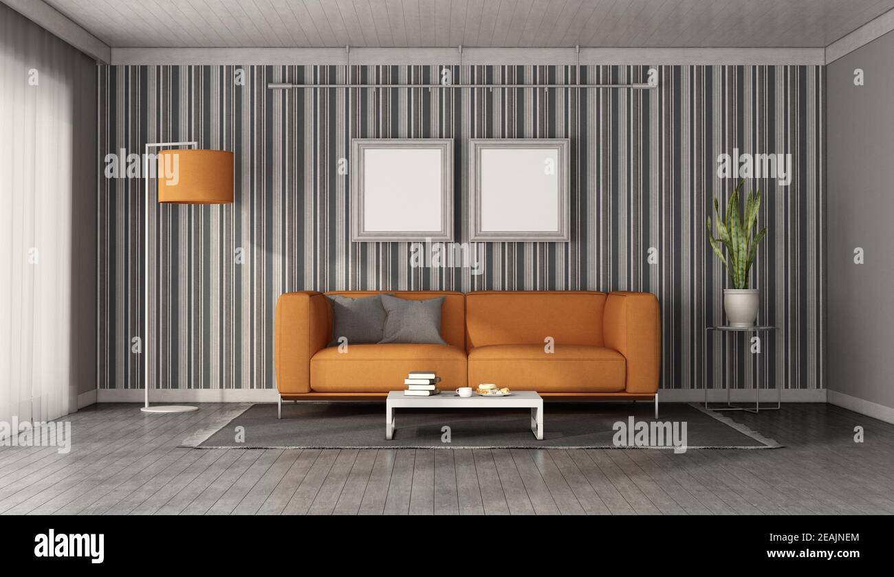 Orange sofa in a modern living room Stock Photo