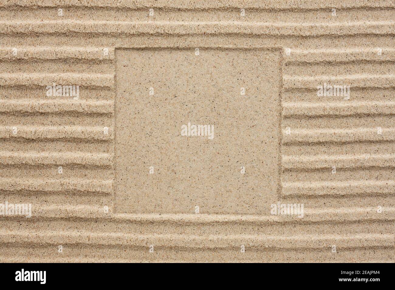 Embossed square in the sand Stock Photo