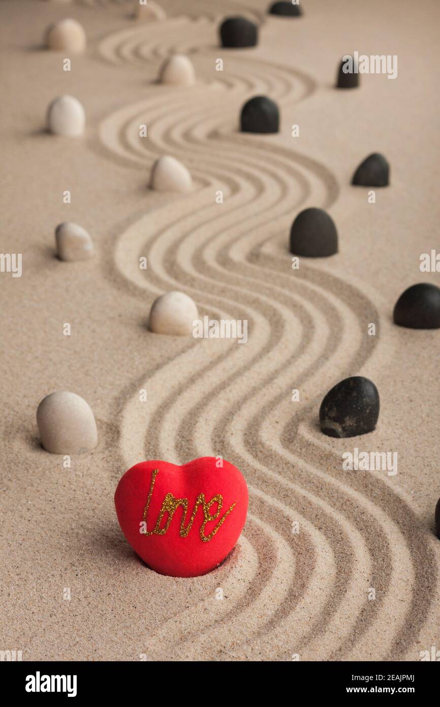 One conceptual heart in the sand Stock Photo