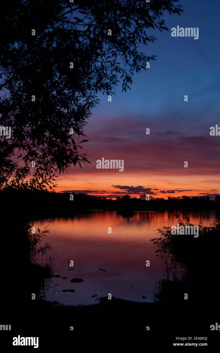 Sunset over the pond Rezabinec near Pisek town, Southern Bohemia, Czech Republic Stock Photo