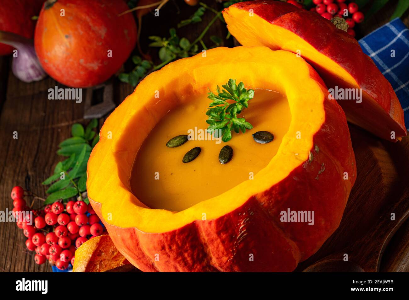 Delicious autumn pumpkin soup with baguette Stock Photo