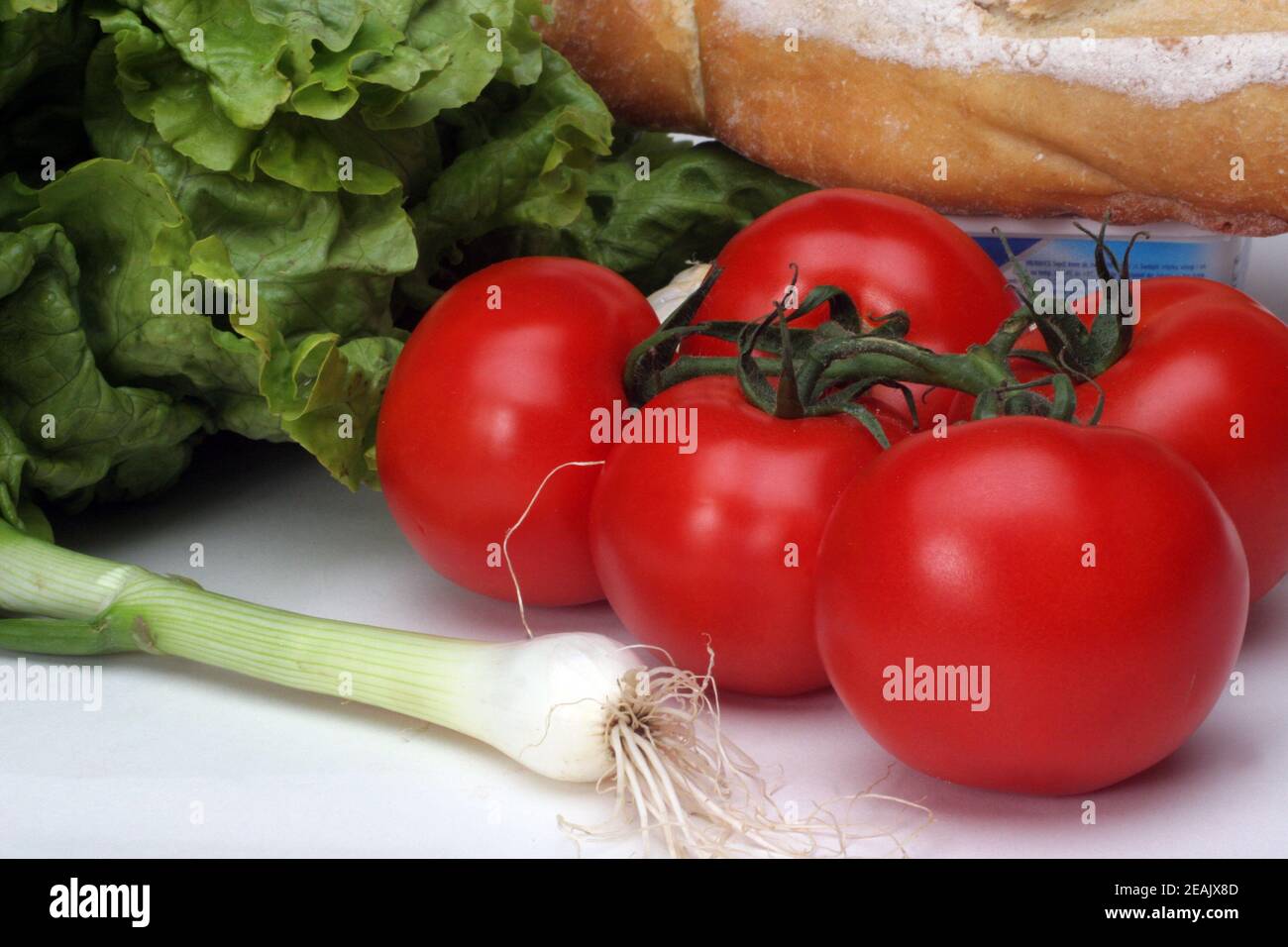 Composition with raw vegetables and bread Stock Photo