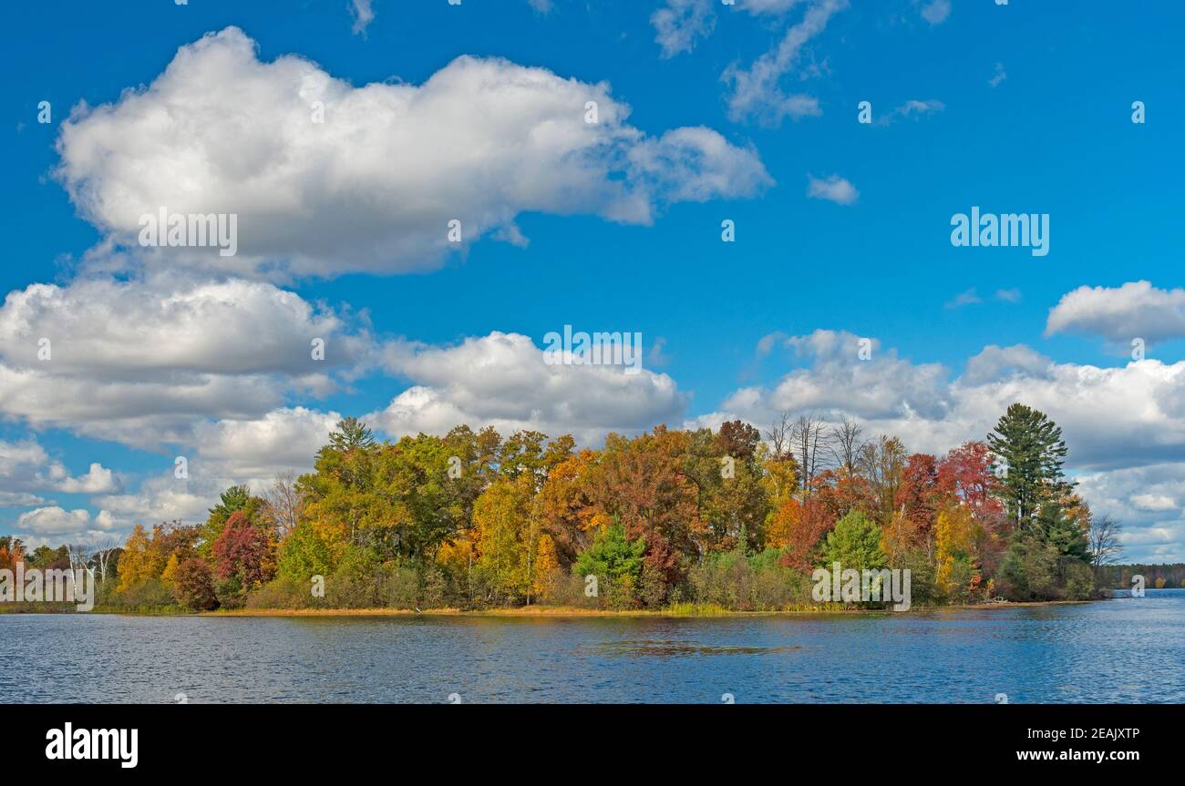 Puffy Clouds on a Sunny Autumn Day Stock Photo