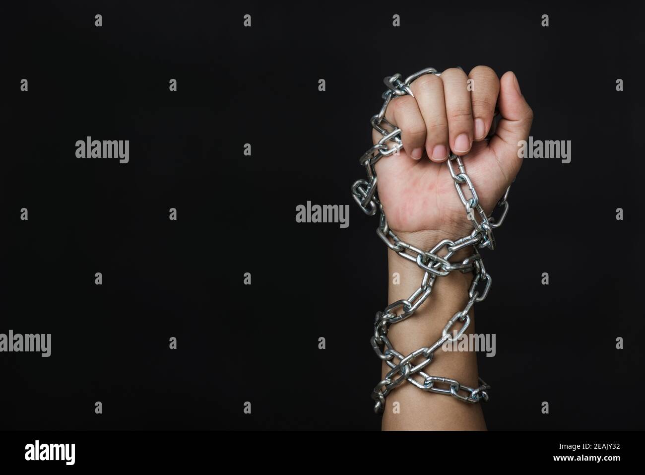 Woman chained on hand Stock Photo