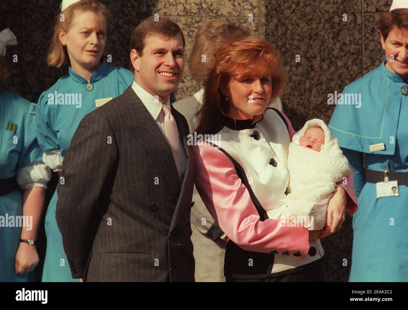 File photo dated 30/3/1990 of the Duke and Duchess of York pause outside the Portland Hospital in London with the duchess holding Princess Eugenie. James and Philip have become the new favourite names at the bookmakers for Princess Eugenie's baby boy. Stock Photo