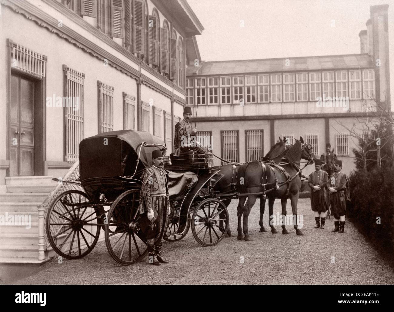 Turkish courtiers with horse drawn carriage in front of Yıldız Palace, Istanbul, Turkey, 19th century Stock Photo