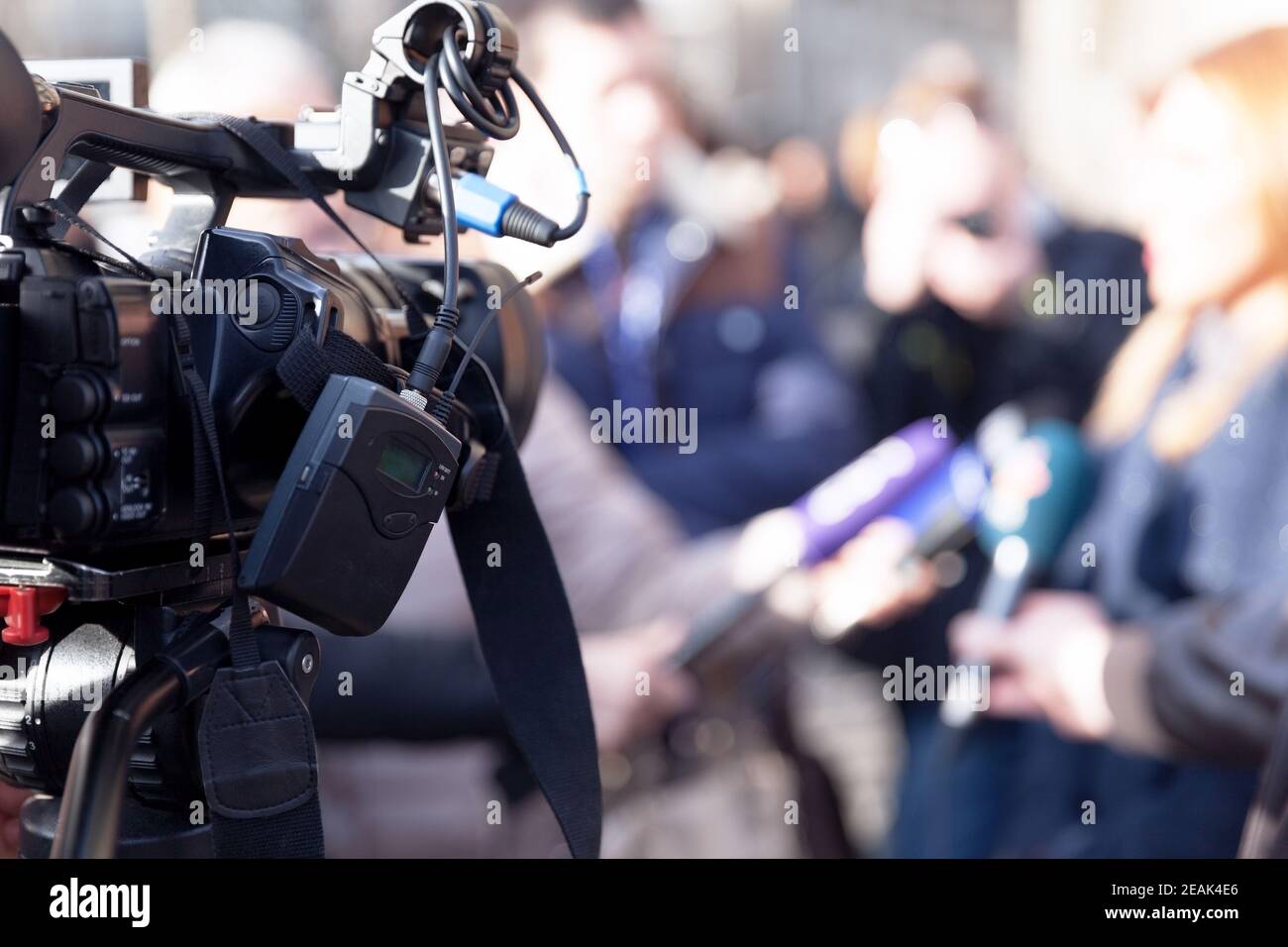 Filming media event with a video camera Stock Photo