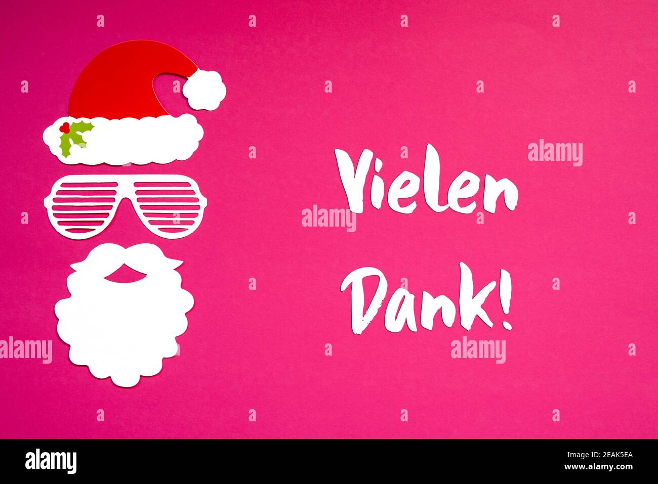Santa Claus Paper Mask, Pink Background, Danke Means Thank You Stock Photo