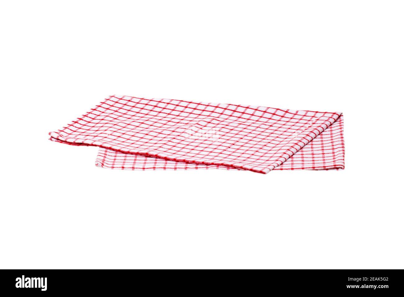 Closeup of a red and white checkered kitchen cloth or napkin isolated on white background. Kitchen accessories. Macro photgraph. Stock Photo