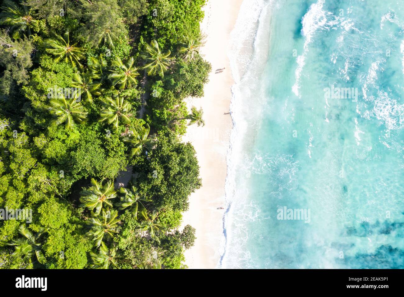 Seychelles Takamaka beach sea waves vacation ocean drone view aerial photo Stock Photo