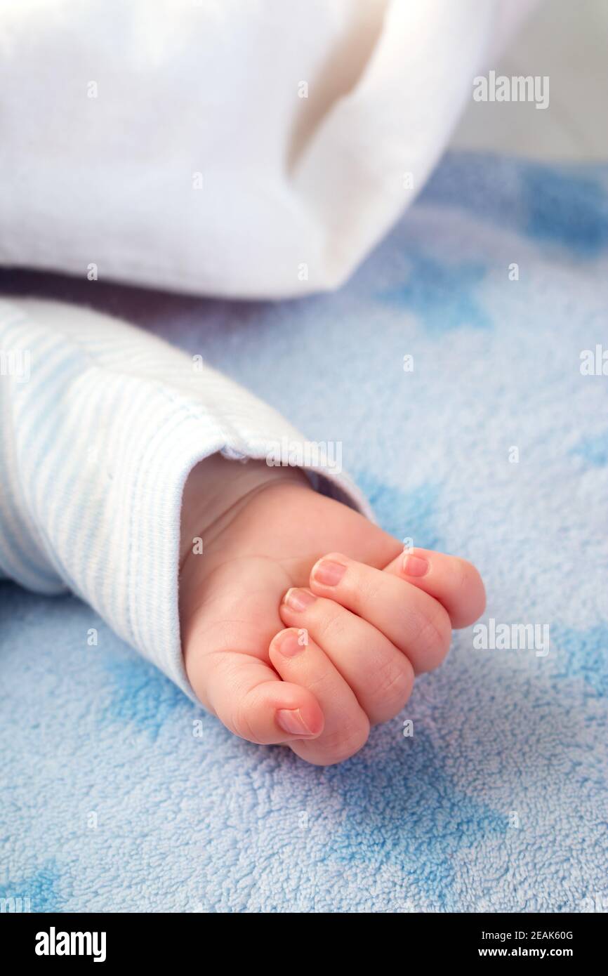 Hand of sleeping baby Stock Photo Alamy