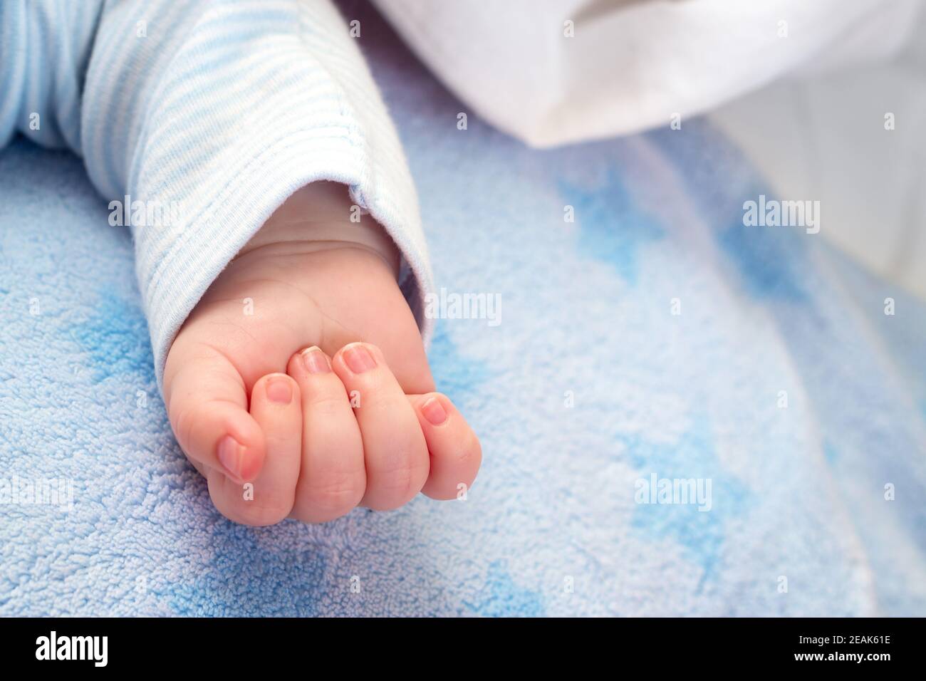 Hand of sleeping baby Stock Photo Alamy
