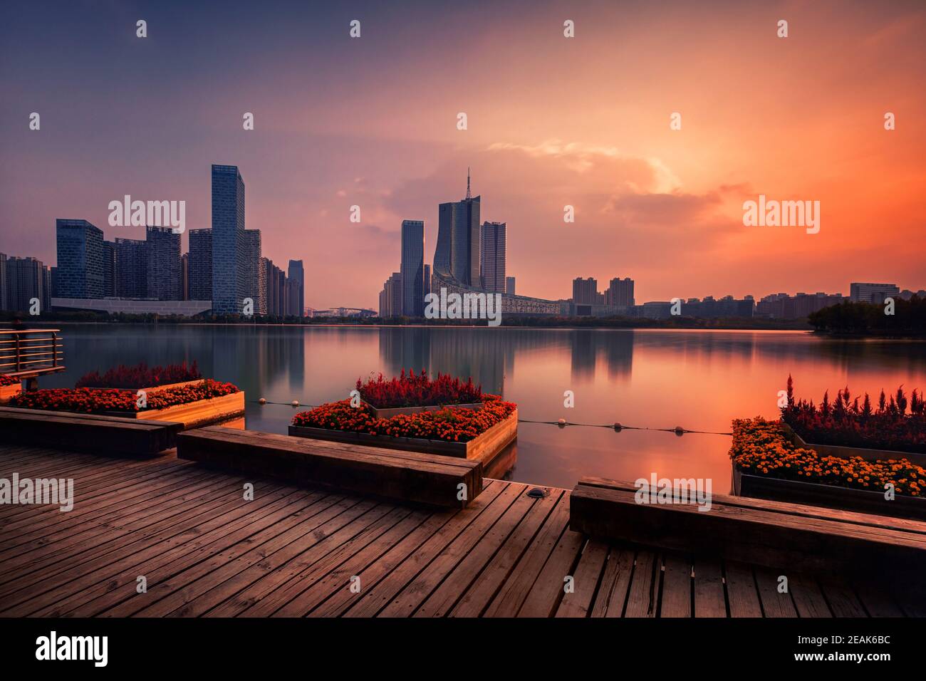 sunset over Swan Lake financial business district, Hefei city, China Stock Photo