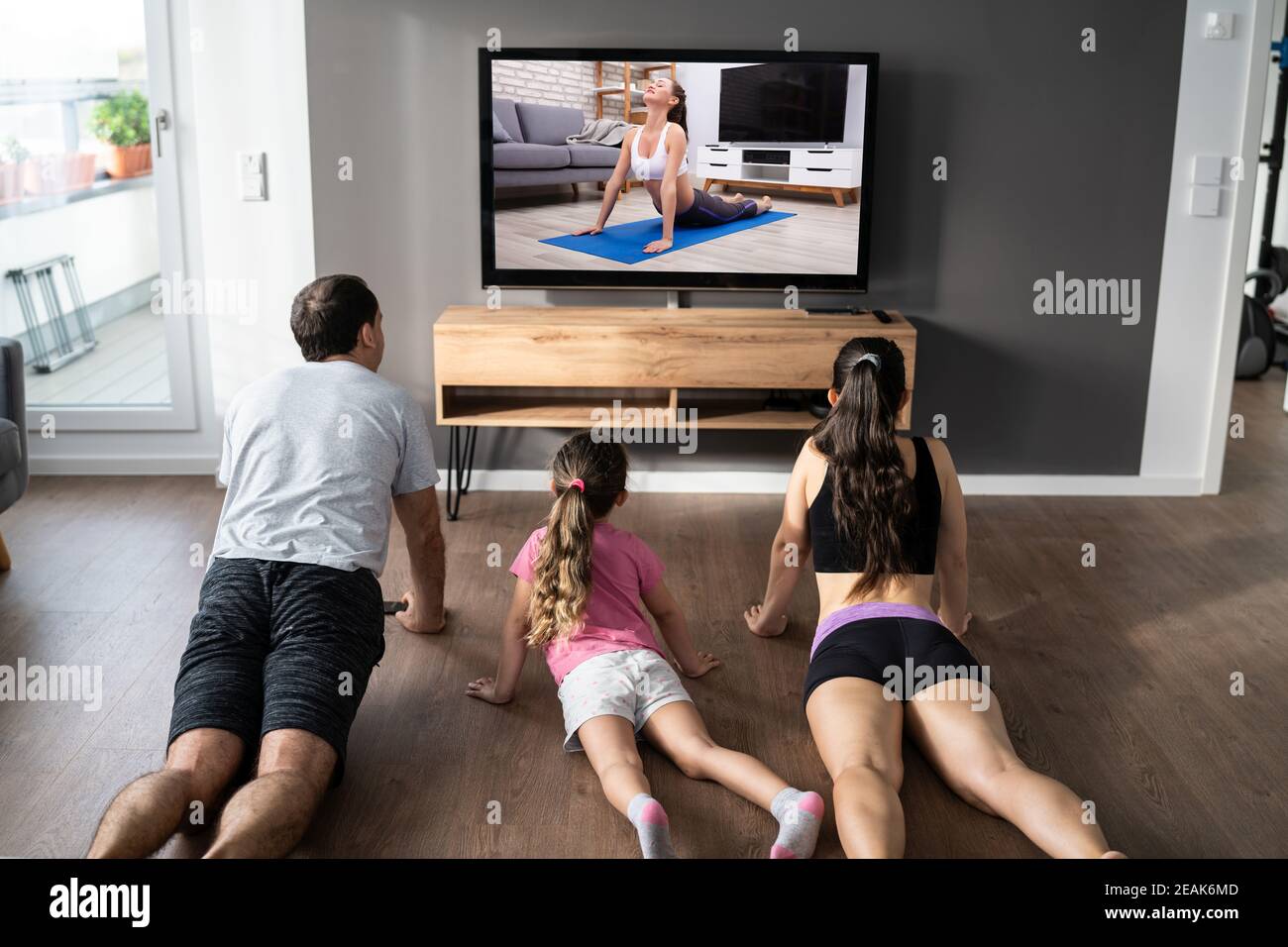 Fit Family Doing Home Online Stretching Yoga Fitness Stock Photo