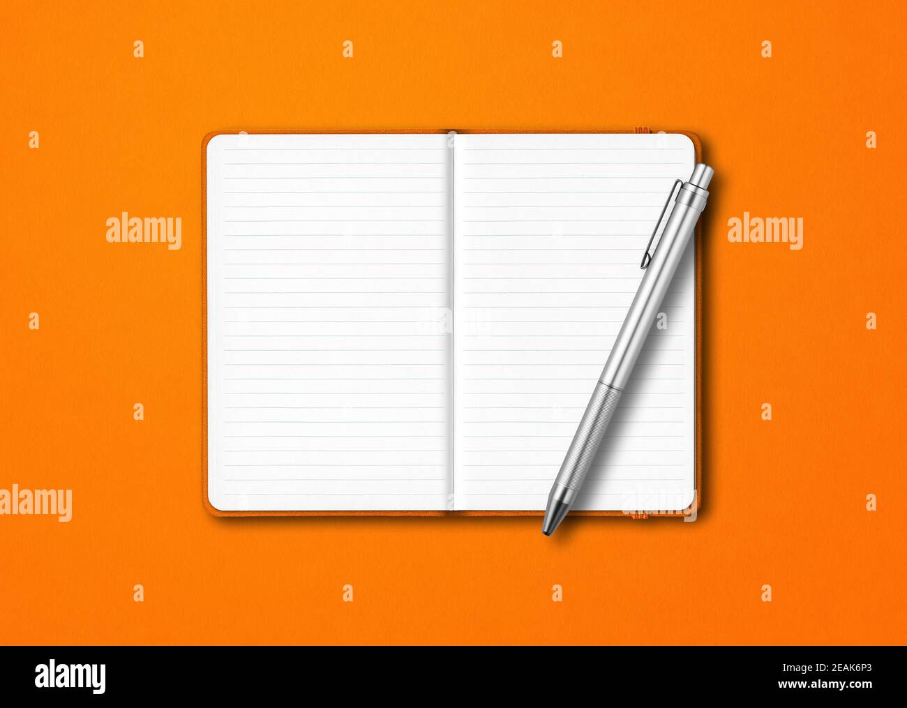 Orange open notebook with a pen isolated on colorful background Stock Photo