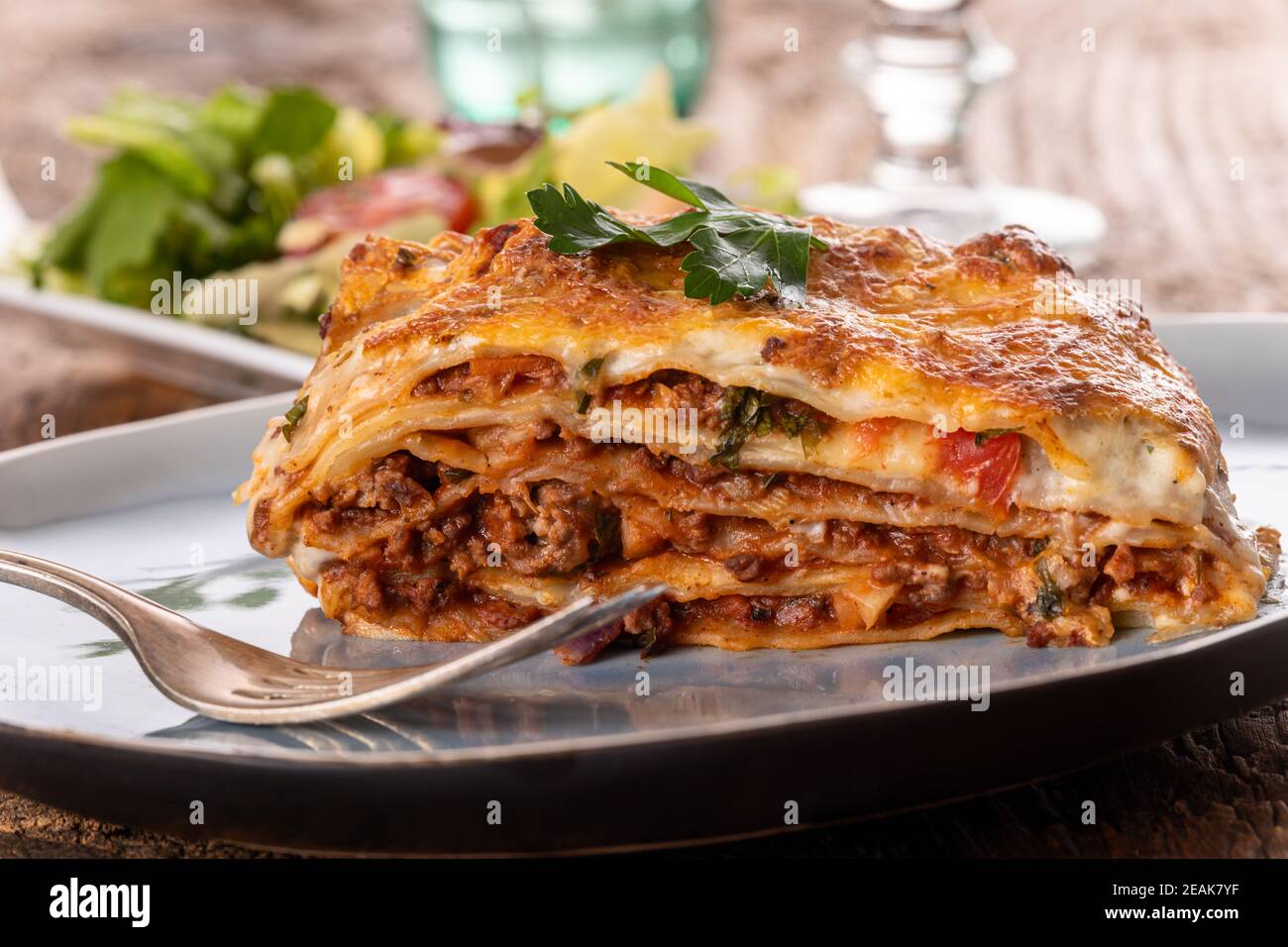 portion of lasagna on a plate Stock Photo