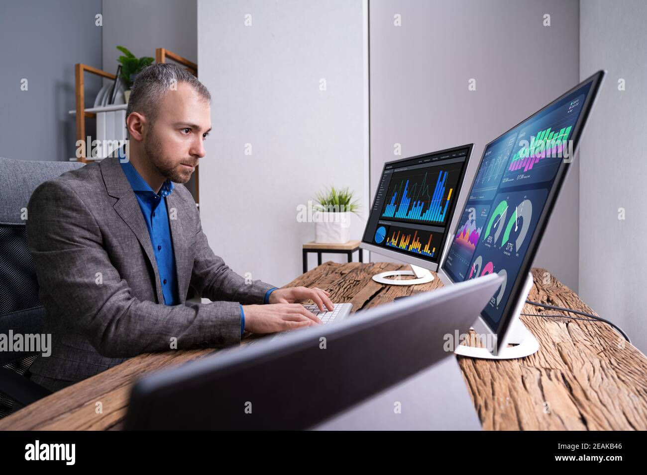 Financial Analyst Or Advisor Using KPI Data Technology Stock Photo