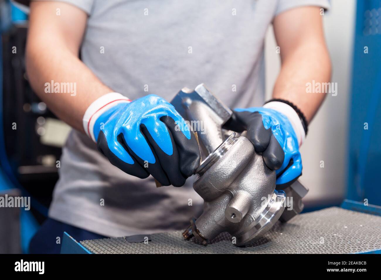 Manual work in the automotive industry Stock Photo