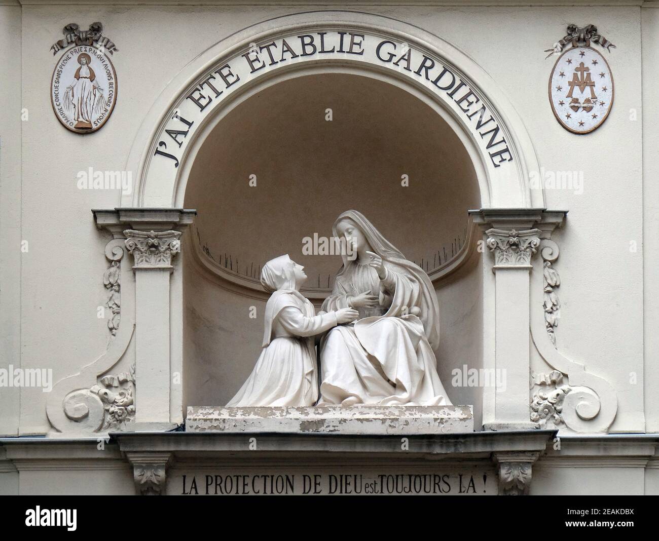 Statue of St Catherine and the Virgin Mary outside the Chapelle Notre Dame de la Medaille Miraculeuse in Paris, France Stock Photo