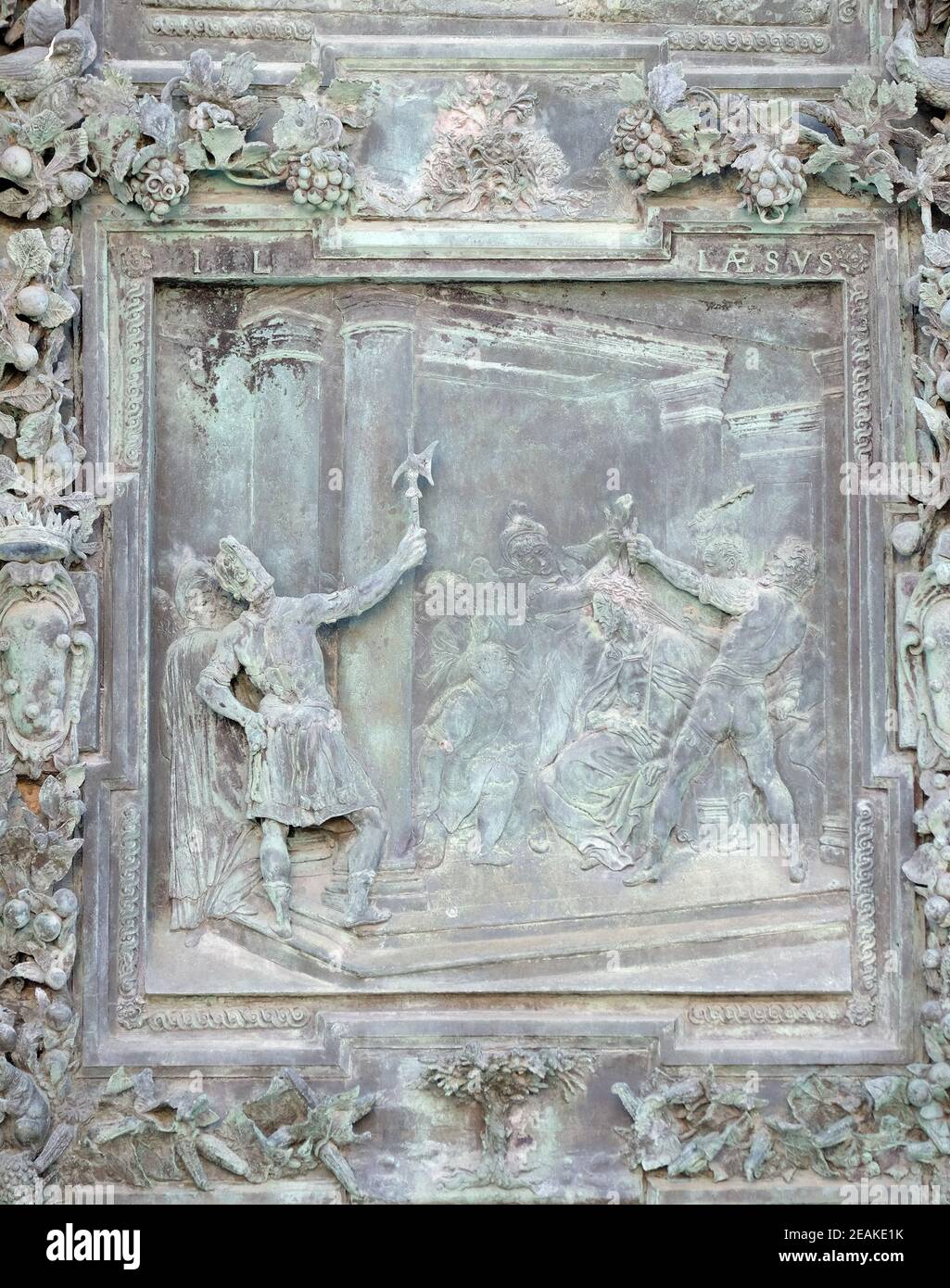 Christ Crowned with Thorns, sculpture work from Giambologna's school, portal of the Cathedral St. Mary of the Assumption in Pisa, Italy Stock Photo