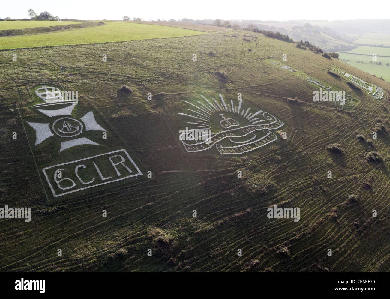 An aerial view of the Fovant Badges in Wiltshire. Many of the regimental badges were cut into the chalk hillside near Fovant by soldiers garrisoned nearby during the First World War. Picture date: Wednesday October 24, 2018. Stock Photo