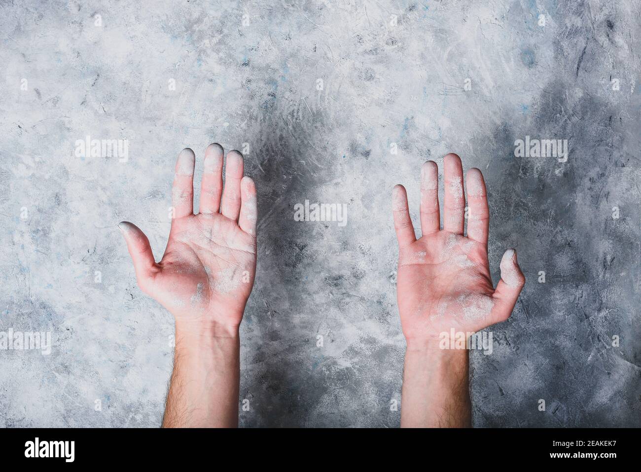 Man hands covered with paint Stock Photo