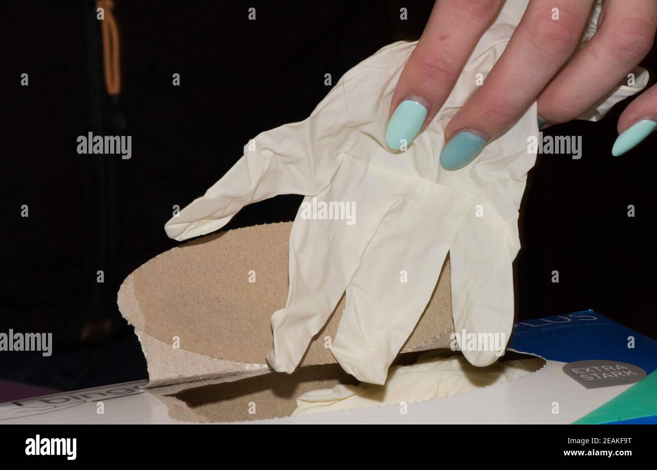 latex glove with danger of epidemics Stock Photo