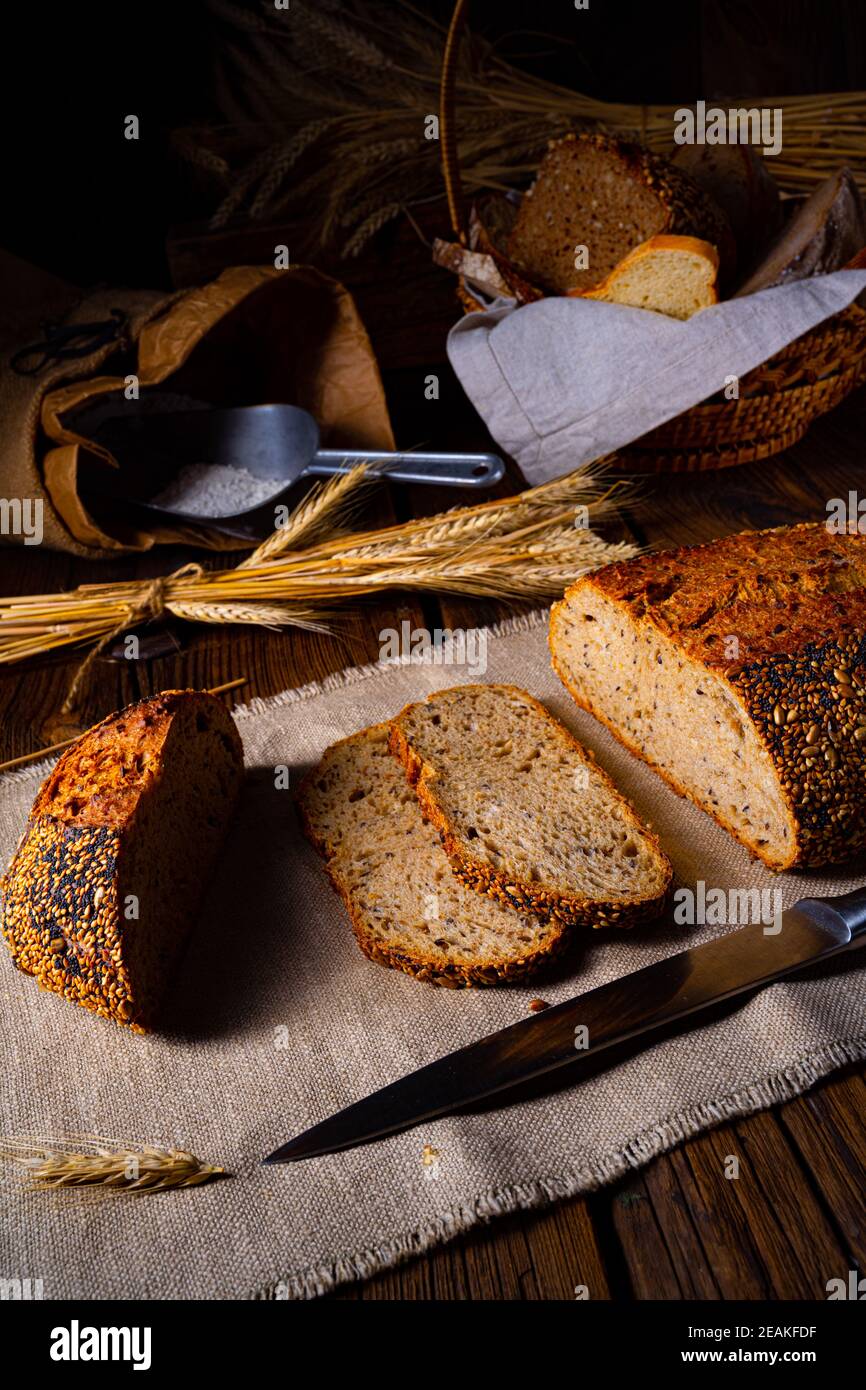 Flaxseed bread with a poppy seed and sesame mixture Stock Photo