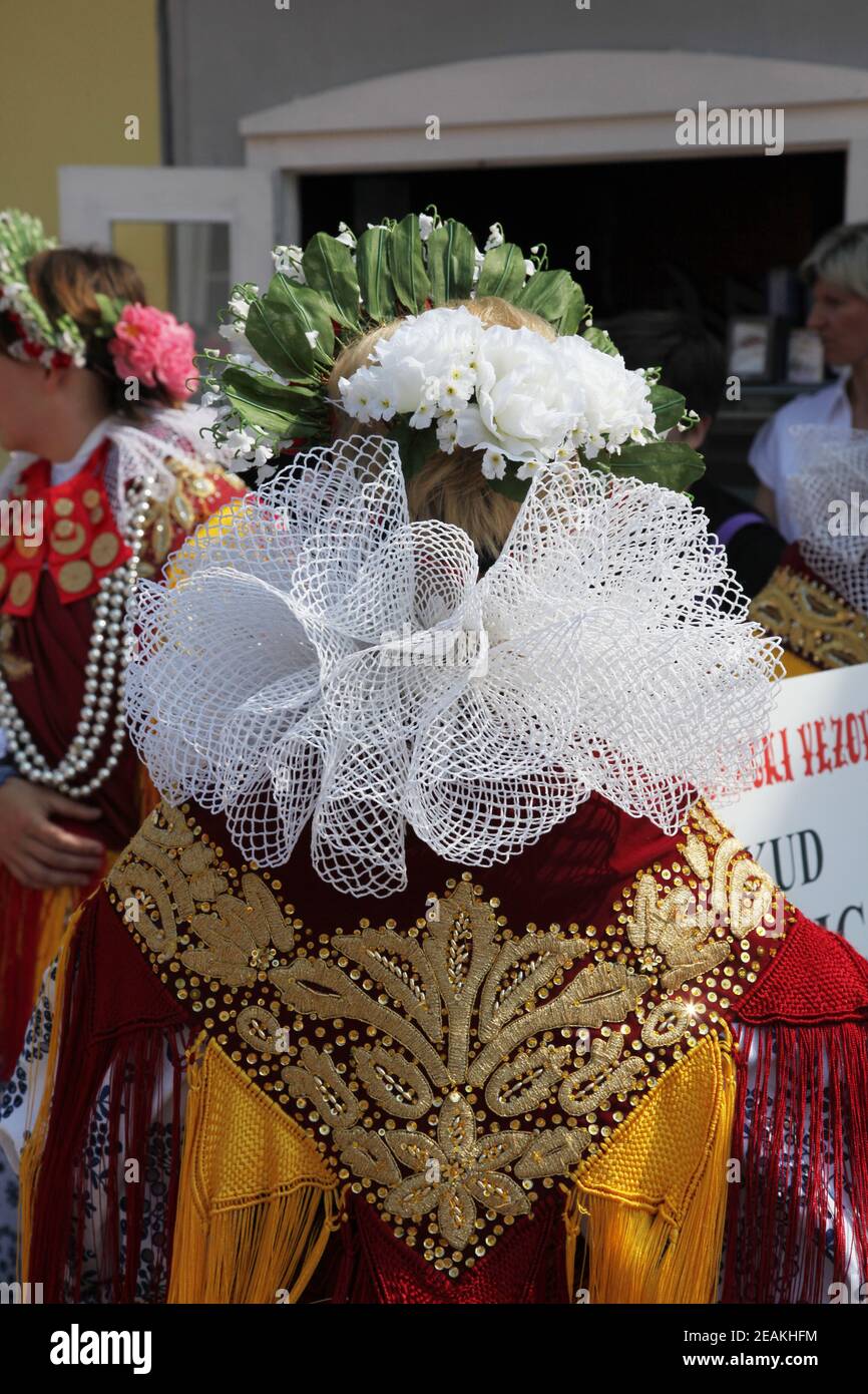 Participant in Croatian national costume from the village Habjanovci, during the Dakovacki vezovi (Dakovo Summer Festival) in Dakovo, Croatia. Stock Photo
