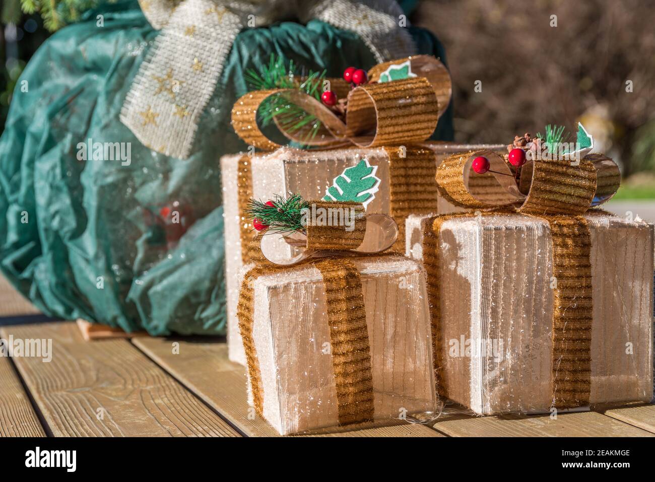 Christmas packages as garden decorations Stock Photo