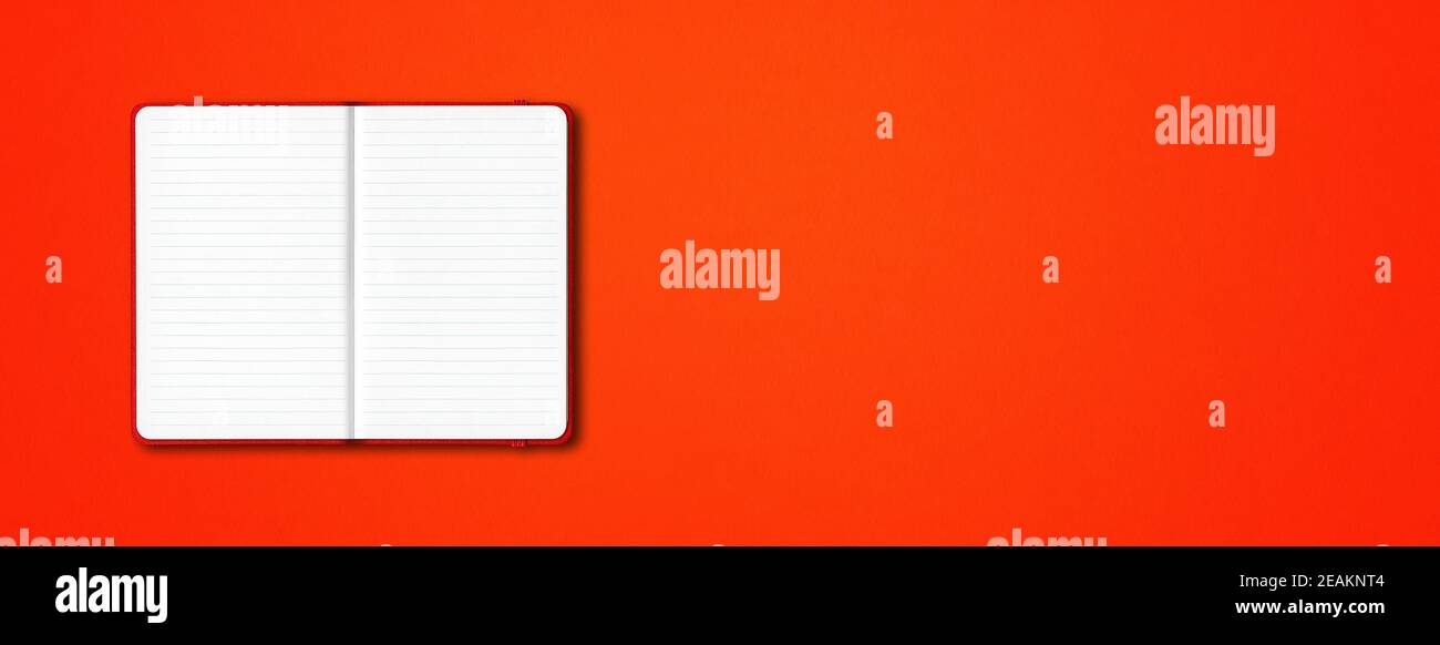 Red open lined notebook isolated on colorful background. Horizontal banner Stock Photo