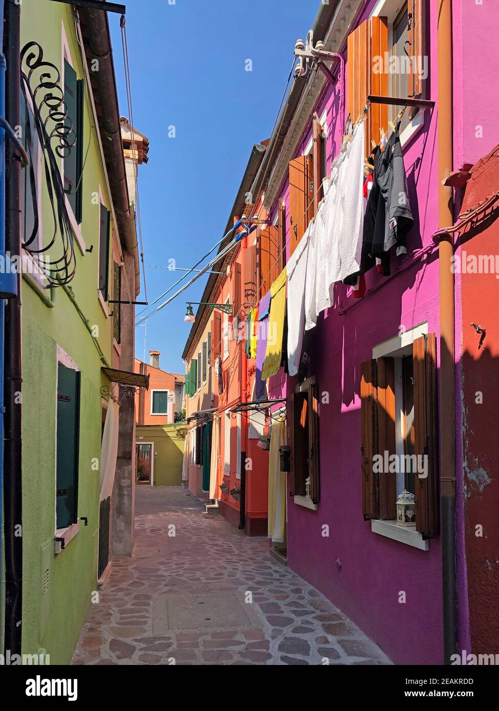Brightly coloured houses at Burano, island in the Venetian Lagoon, Venice, Italy Stock Photo