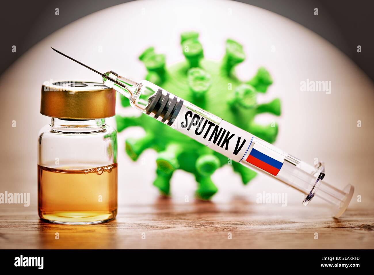 Vaccine Vial, Syringe And Coronavirus Model, Russian Sputnik V Vaccine Stock Photo