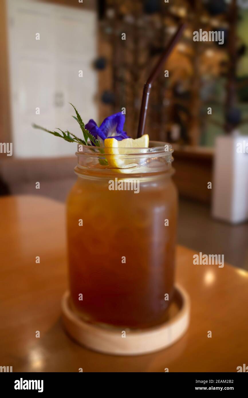 Glass of iced lemon tea with butterflypea drink Stock Photo Alamy