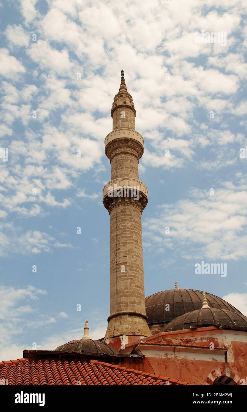 The minaret of the Murad Reis mosque in the Old Town of Rhodes island, Greece. The mosque was built in 1524. Stock Photo