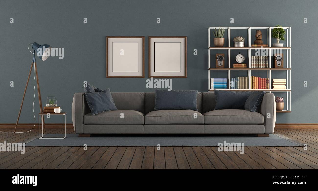 Blue room with modern sofa and bookcase Stock Photo