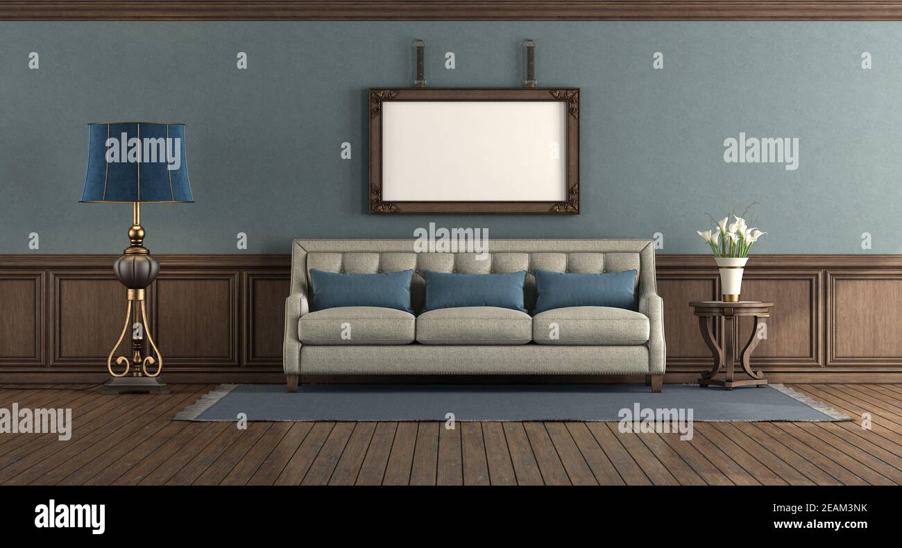 Classic style living room with wooden boiserie on the wall Stock Photo