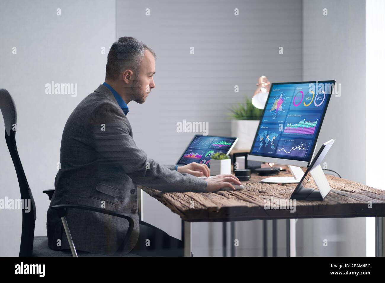 Financial Analyst Or Advisor Using KPI Data Technology Stock Photo