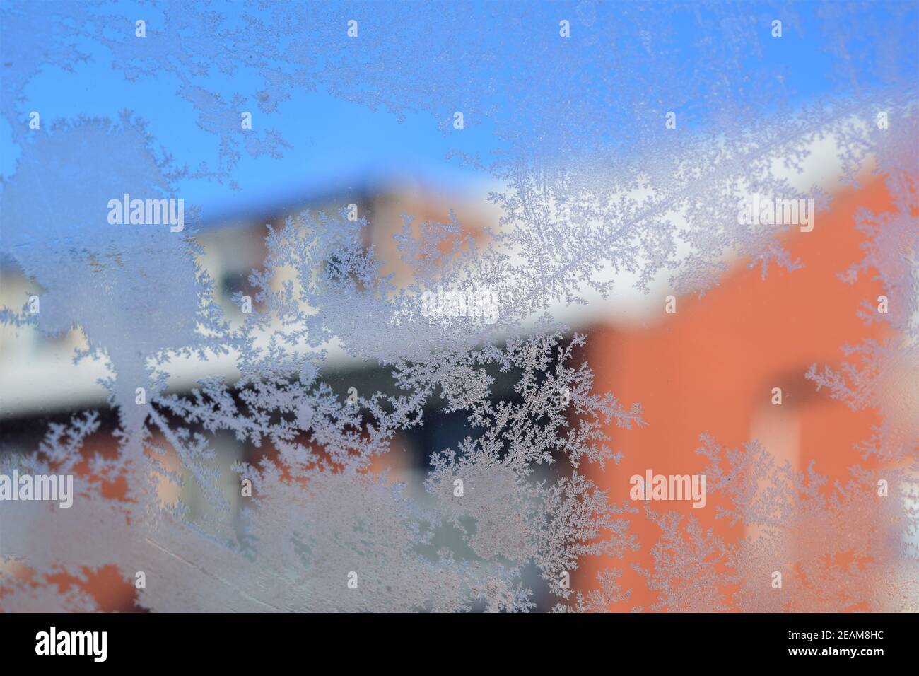 Closeup texture of a frosty pattern on a window glass Stock Photo - Alamy