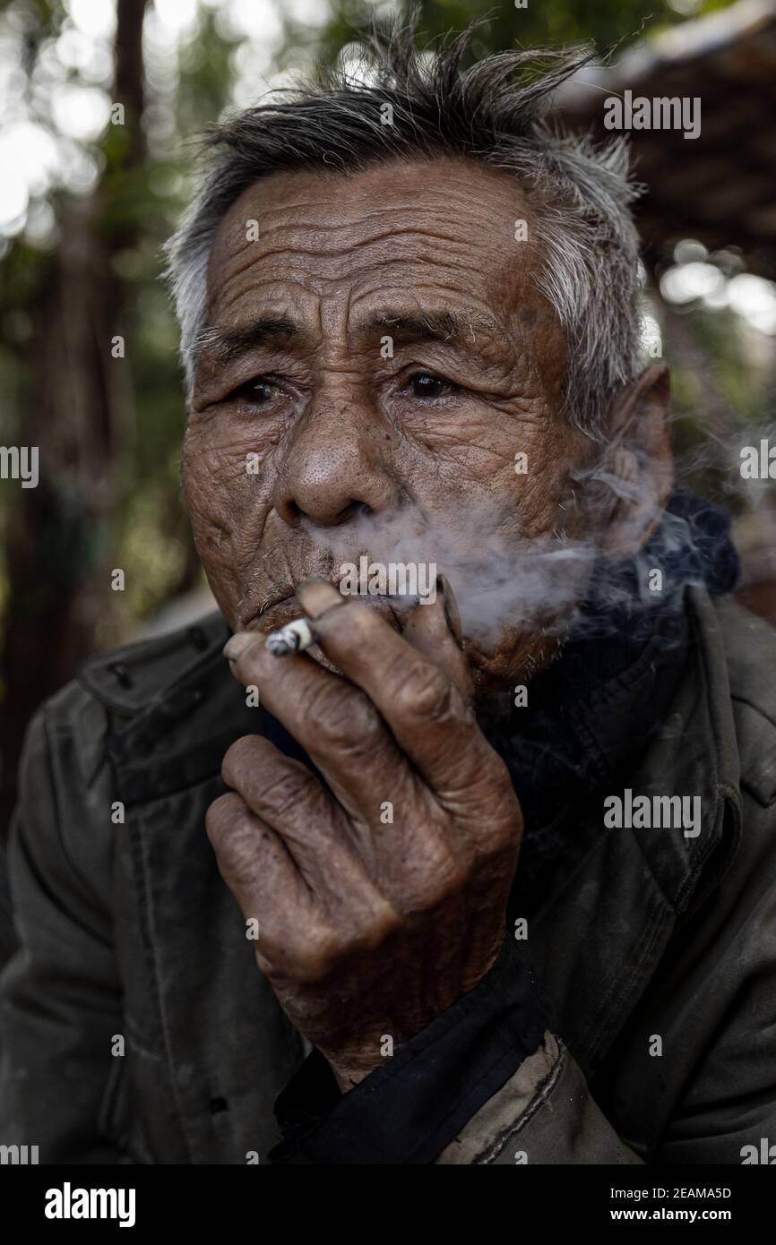 Portrait of an old Man in Vietnam Stock Photo Alamy