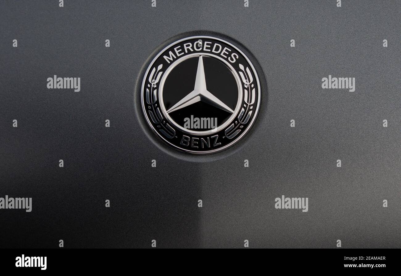 Matt grey Mercedes Benz, drive, luxury, automobile, logo Stock Photo