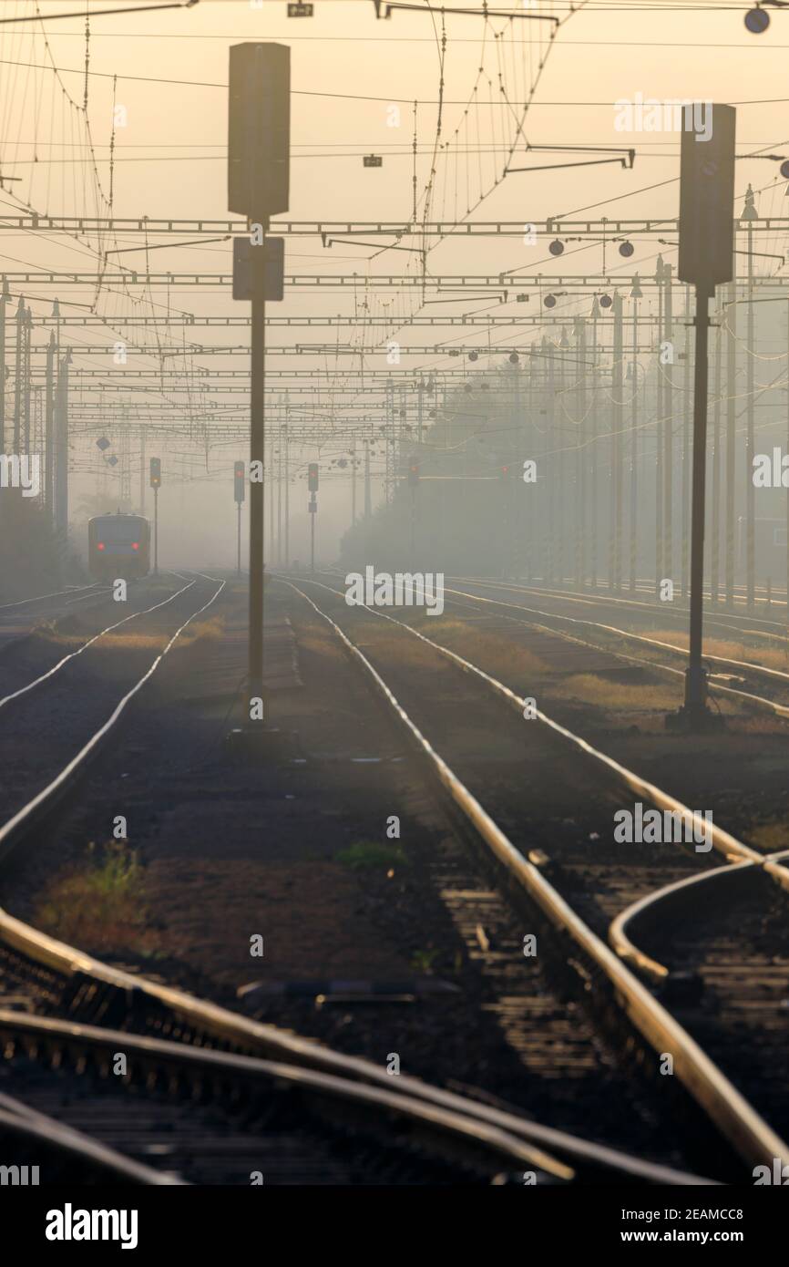 medium-sized railway station in the morning fog, Czech Republic Stock Photo