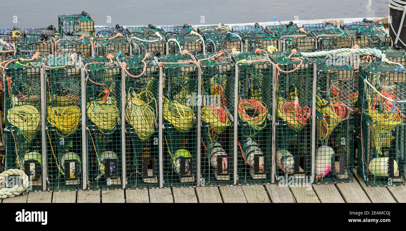 Lobster traps await the start of the season at Peggy's Cove Nova Scotia Stock Photo