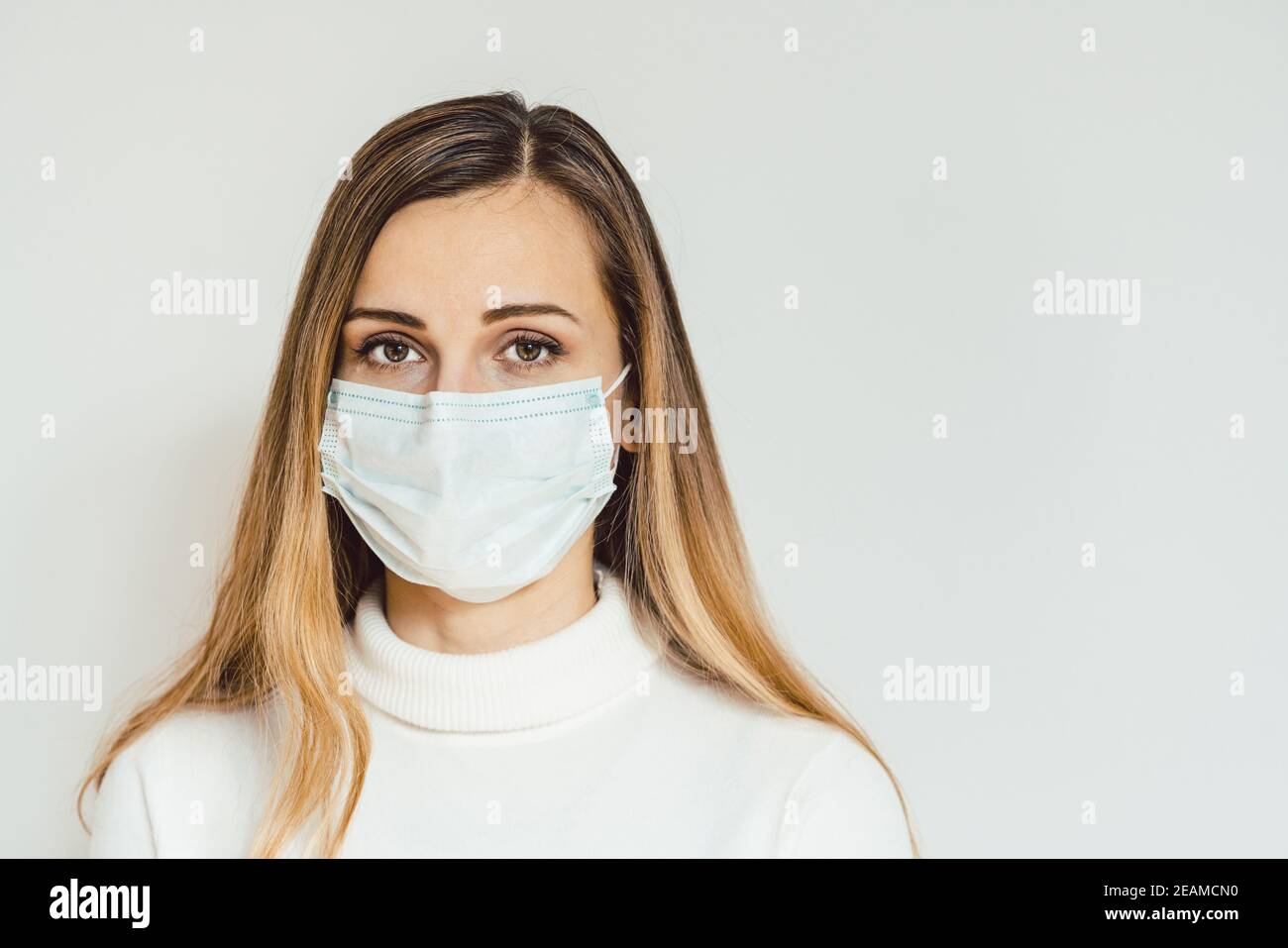 Worried woman during Covid-19 crisis in quarantine Stock Photo