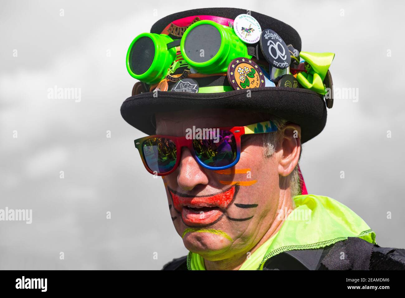 Member of Borderline Morris dancers. Morris Dancer close up of face and hat at Swanage, Dorset UK in September Stock Photo