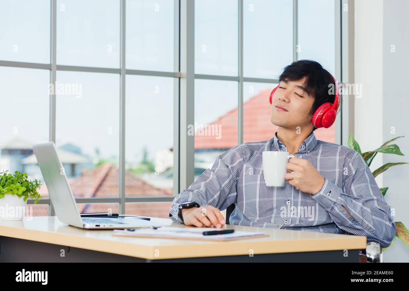 man lifestyle smile relax holding a coffee cup Stock Photo