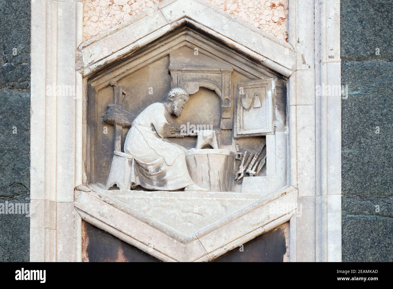 Tubalcain by Nino Pisano, 1334-36., Relief on Giotto Campanile of Cattedrale di Santa Maria del Fiore (Cathedral of Saint Mary of the Flower), Florence, Italy Stock Photo