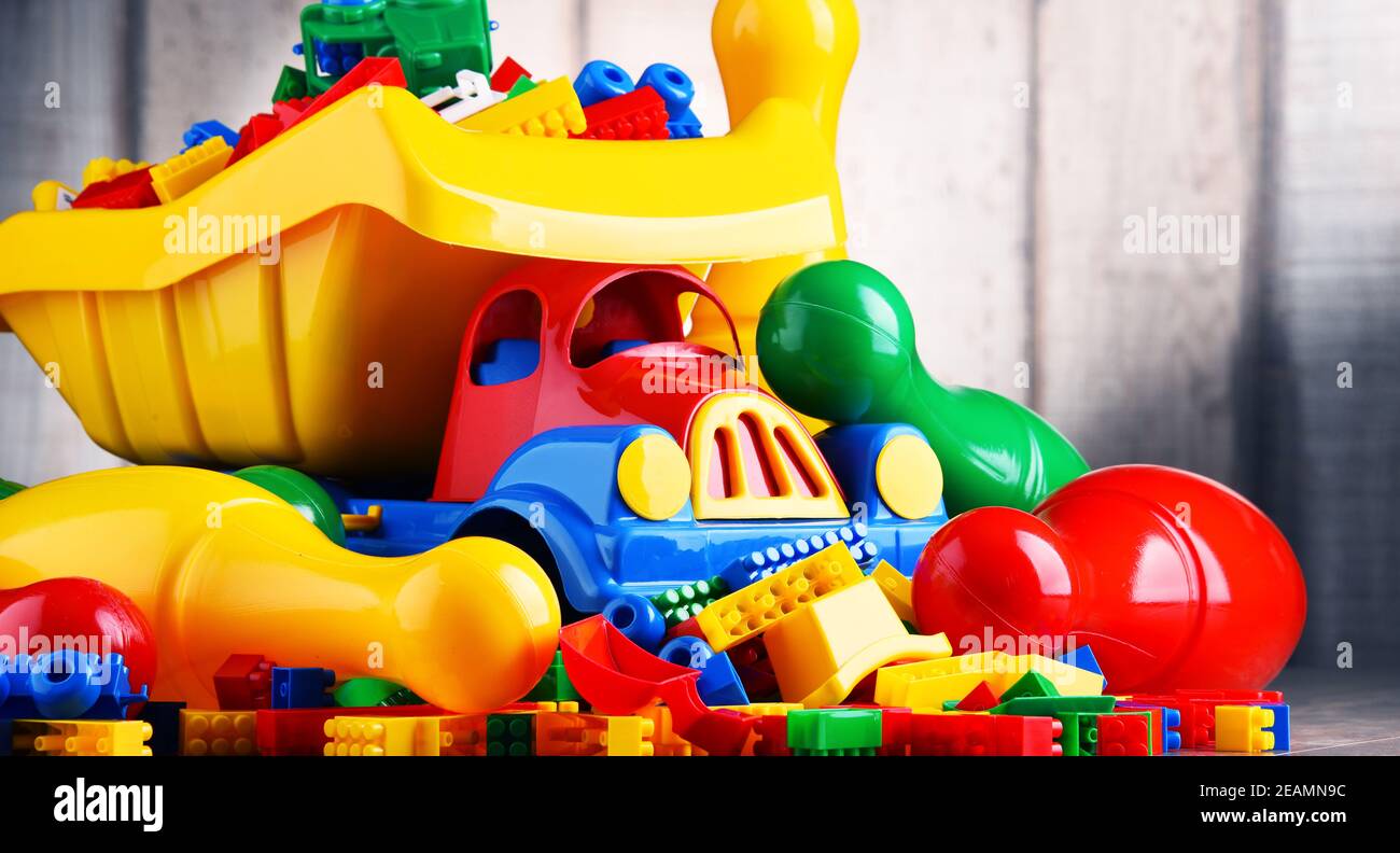 Colorful plastic toys in children's room Stock Photo Alamy
